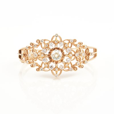 Lot 416 - Diamond Rigid Bracelet, 45 diamonds, center stone about 1.25 cts., 44 diamonds about 2.00 cts.,     14K 15 dwt., stone damaged