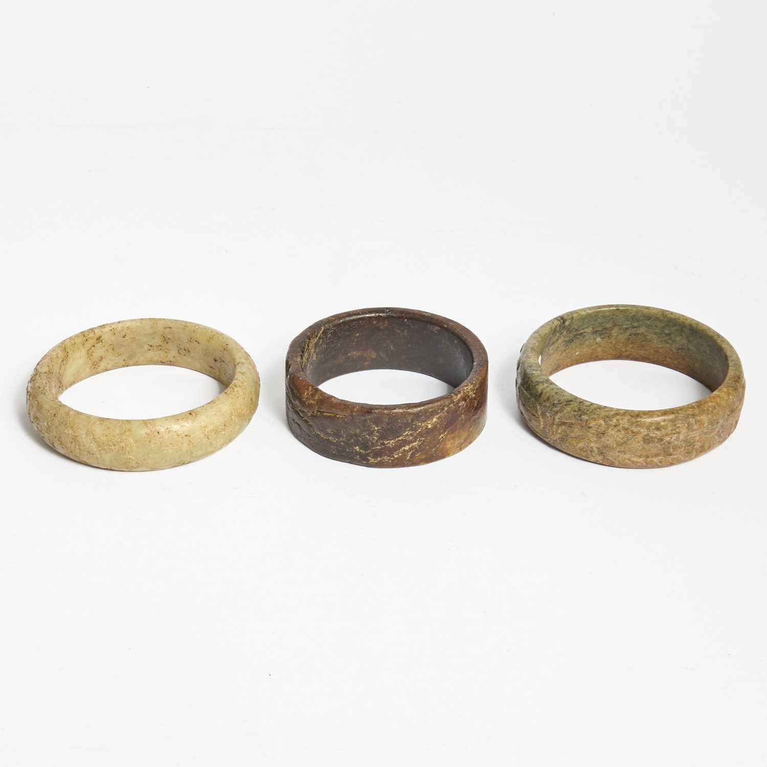 Lot 15 - Three Chinese Archaic Jade Bangles