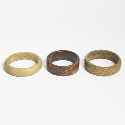 Lot 15 - Three Chinese Archaic Jade Bangles