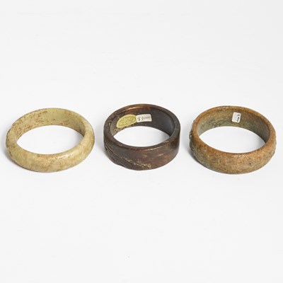 Lot 15 - Three Chinese Archaic Jade Bangles