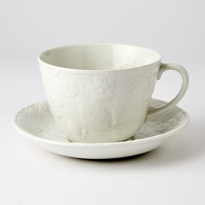 Lot 94 - Burgess & Leigh "Strawberry and Grape Leaf (Davenport) White Embossed Porcelain Partial Tea Service