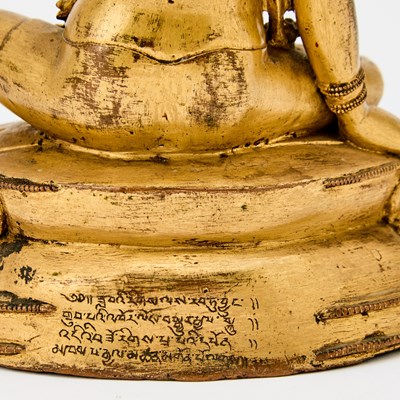 Lot 365 - A Rare Tibetan Gilt Bronze Figure of Virupa