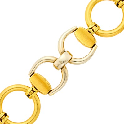 Lot 83 - Wide Two-Color Gold Stirrup Link Bracelet
