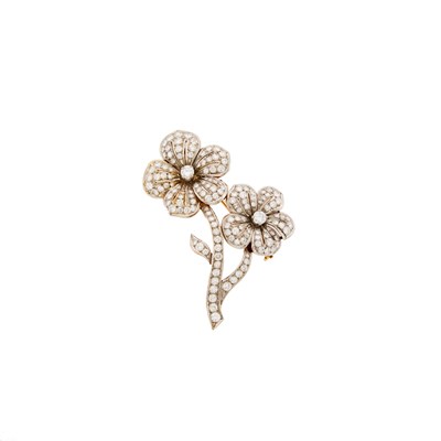 Lot 1129 - Two-Color Gold and Diamond Flower Brooch