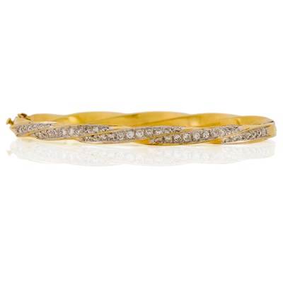 Lot 1002 - Gold and Diamond Bangle