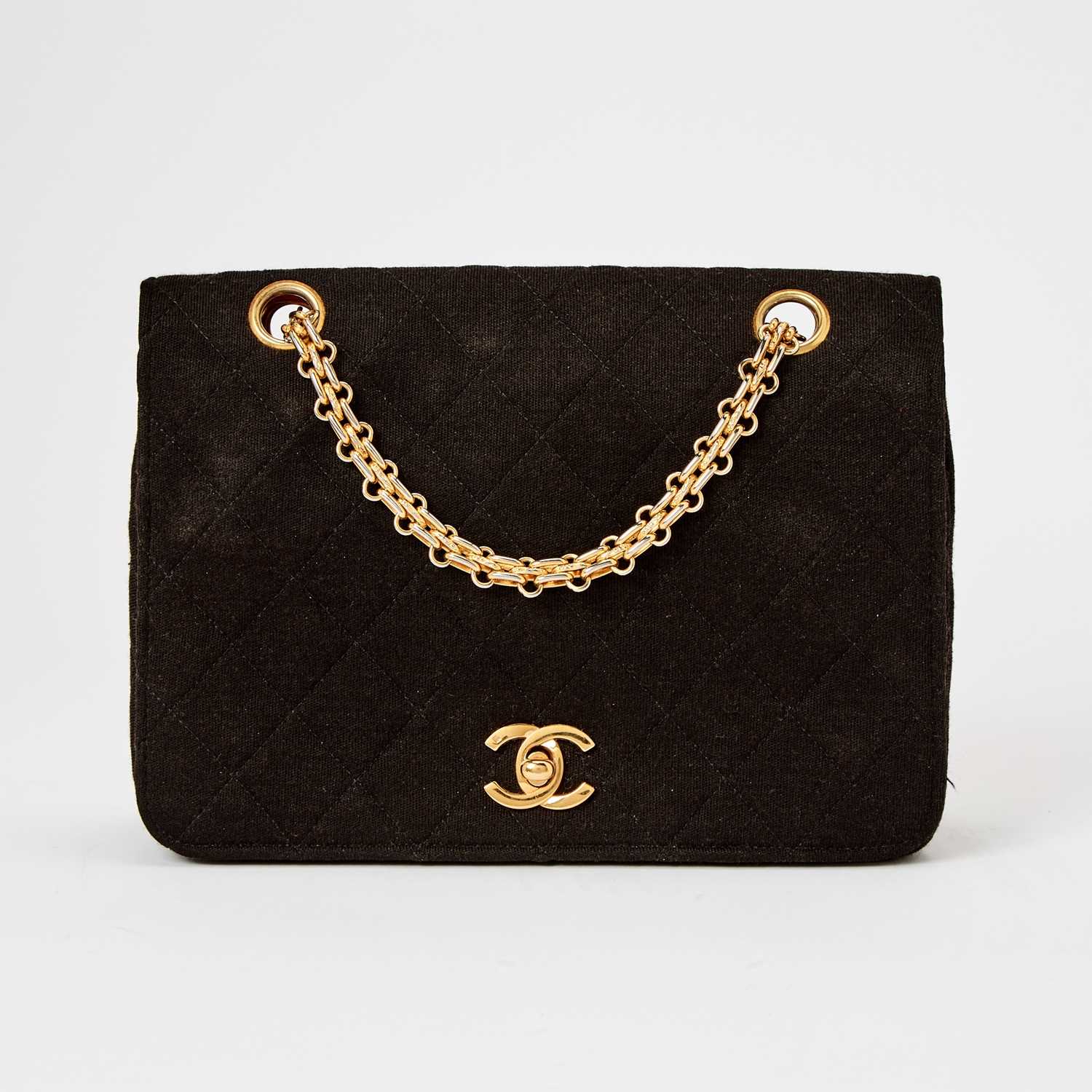 Lot 1253 - Chanel Black Quilted Fabric Flap Bag