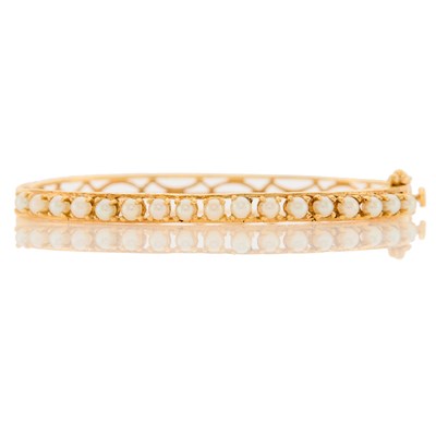 Lot 1077 - Gold and Cultured Pearl Bangle Bracelet