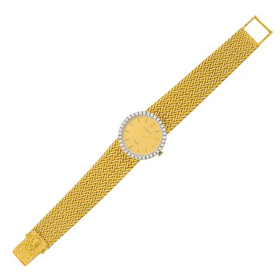 Lot 53 - Corum Two-Color Gold and Diamond Mesh Wristwatch, Retailed by Van Cleef & Arpels