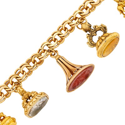 Lot 82 - Gold and Antique Fob Charm Curb Link Bracelet