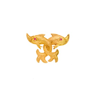 Lot 1033 - Gold and Synthetic Ruby Dolphin Brooch