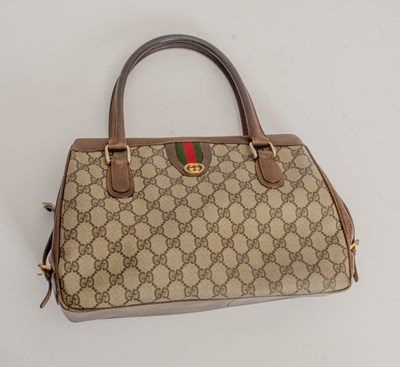 Lot 187 - Gucci Brown Monogramed Leather Handbag