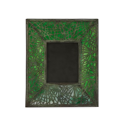Lot 125 - Tiffany Studios Etched Metal and Green Favrile Glass Photograph Frame
