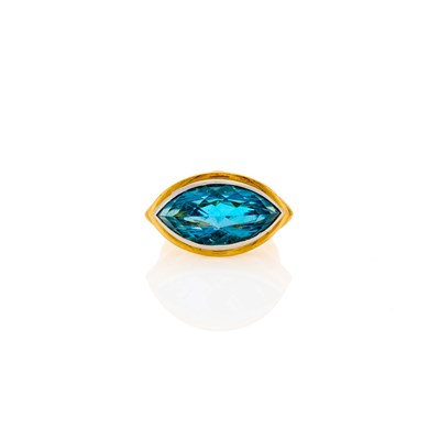 Lot 1239 - Two-Color Gold and Blue Topaz Ring