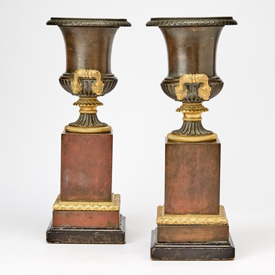 Lot 483 - Pair of Restauration Patinated and Gilt-Bronze Urns on Marble Bases