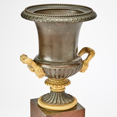 Lot 483 - Pair of Restauration Patinated and Gilt-Bronze Urns on Marble Bases