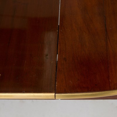 Lot 561 - Louis XVI Brass-Mounted Mahogany Extension Dining Table