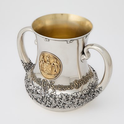 Lot 218 - New York City History: Tiffany & Co. Sterling Silver and Gold Loving Cup
