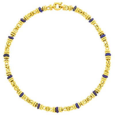 Lot 1038 - Gold and Lapis Bead Chain Necklace