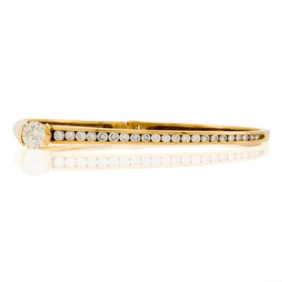 Lot 1018 - Gold and Diamond Bangle Bracelet