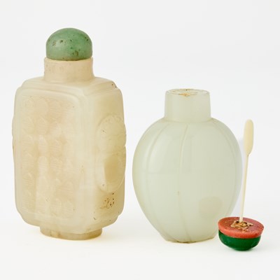 Lot 10 - Two Chinese Carved Pale Celadon Jade Snuff Bottles