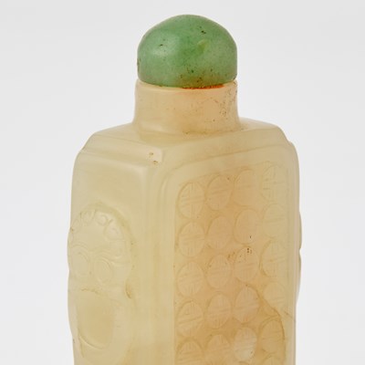 Lot 10 - Two Chinese Carved Pale Celadon Jade Snuff Bottles