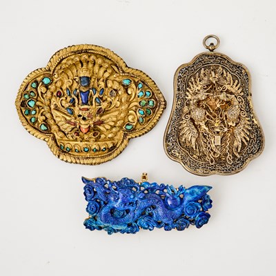 Lot 367 - Three Chinese and Tibetan Metal and Hardstone Pendants