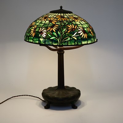 Lot 245 - Tiffany Studios Bronze and Leaded Glass Black-Eyed Susan Table Lamp