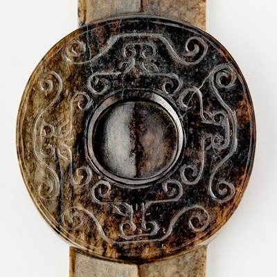 Lot 14 - A Chinese Archaistic Mottled Jade Ceremonial Blade and Disc, Bi