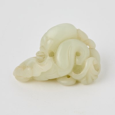Lot 454 - A Chinese White Jade Carving of a 'Water Chestnut Grouping'