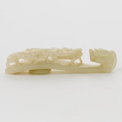 Lot 463 - A Chinese Carved White Jade Belt Hook