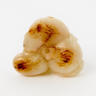 Lot 453 - A Chinese White and Russet Jade Carving