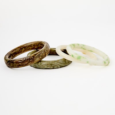 Lot 433 - A Group of Four Chinese Jade Bangles