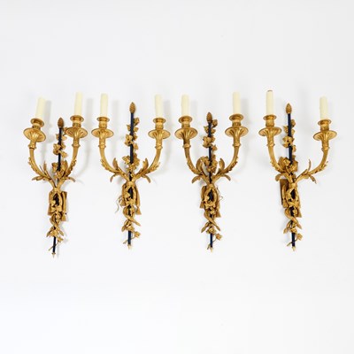 Lot 326 - Set of Four Louis XVI Style Gilt and Patinated Bronze Two-Branch Wall Lights