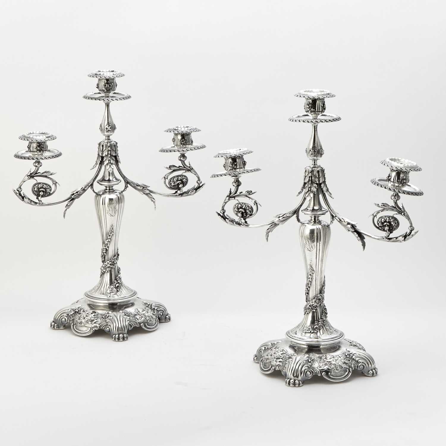 Lot 232 - Pair of Tiffany & Co. Sterling Silver Three-Light Candelabra