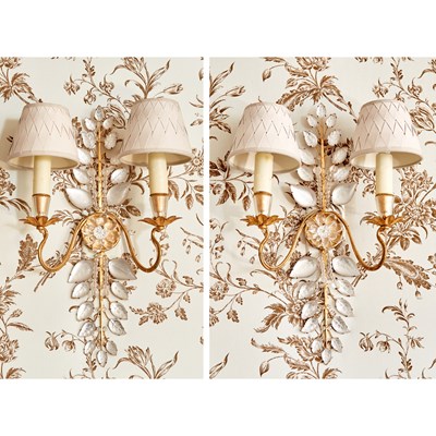 Lot 133 - Pair of Baguès Style Cut Glass-Mounted Gilt-Metal Two-Branch Wall Lights