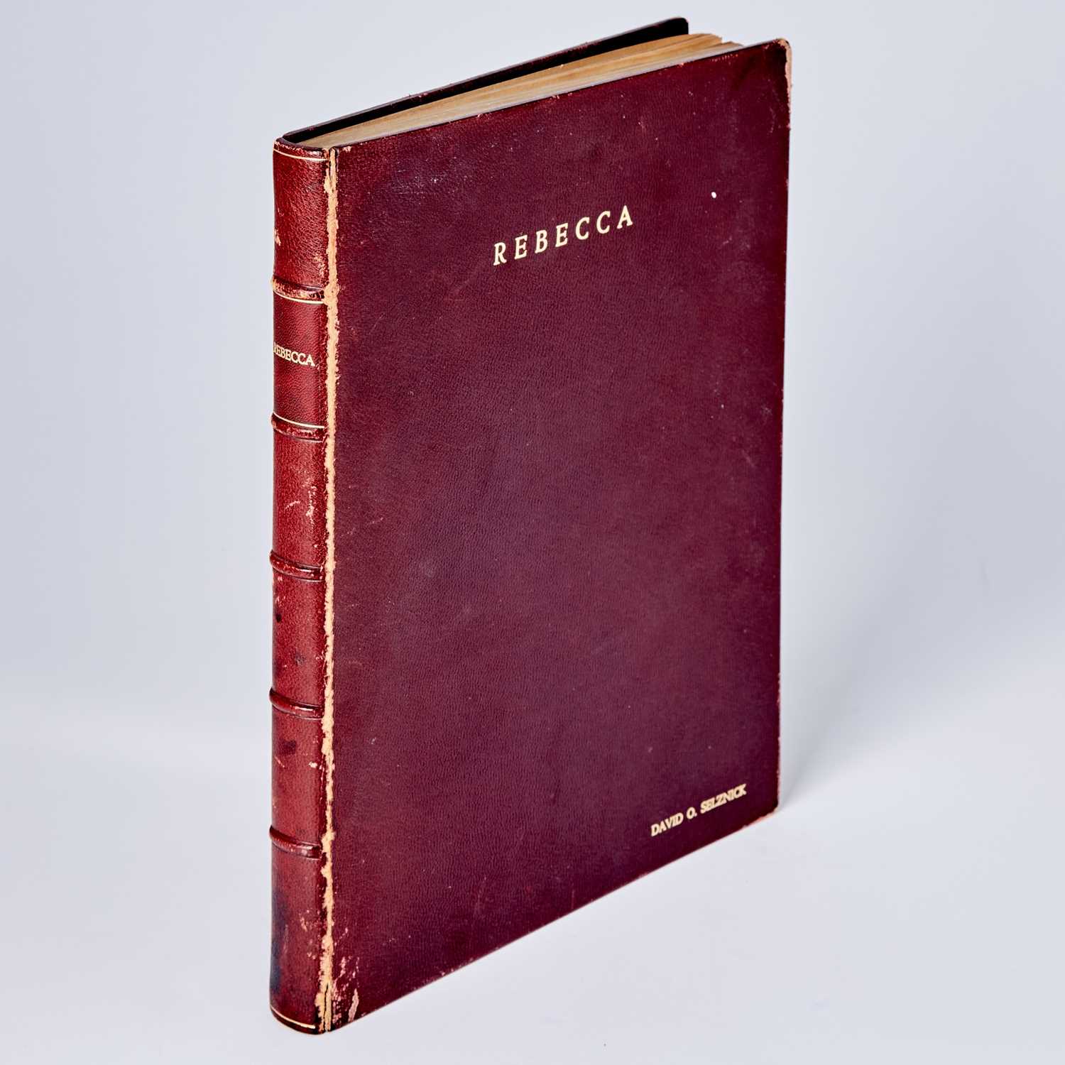 Lot 136 - A presentation copy with photographs of the shooting script for Rebecca, stamped on the cover for producer David O. Selznick