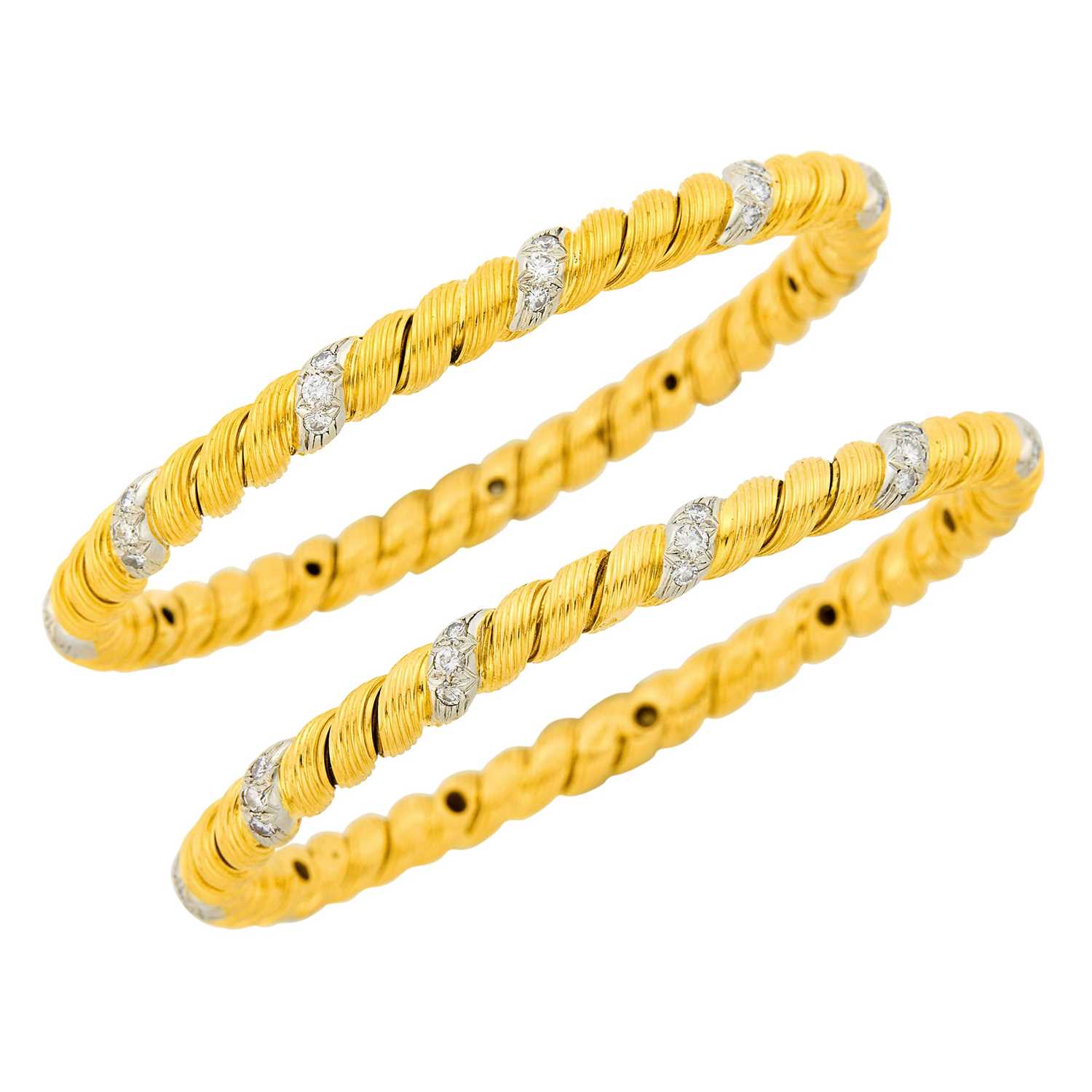 Lot 118 - Van Cleef & Arpels Pair of Fluted Gold, Platinum and Diamond Bangle Bracelets