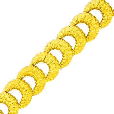 Lot 47 - Tiffany & Co. Wide Hammered Gold Crescent Link Bracelet