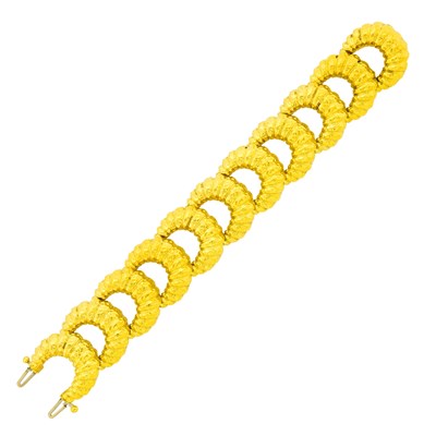 Lot 47 - Tiffany & Co. Wide Hammered Gold Crescent Link Bracelet