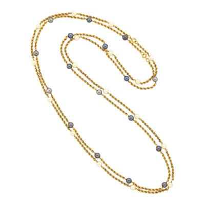Lot 41 - Van Cleef & Arpels Pair of Long White and Black Cultured Pearl Rope-Twist Chain Necklaces, France