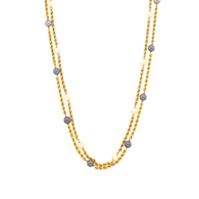 Lot 41 - Van Cleef & Arpels Pair of Long White and Black Cultured Pearl Rope-Twist Chain Necklaces, France