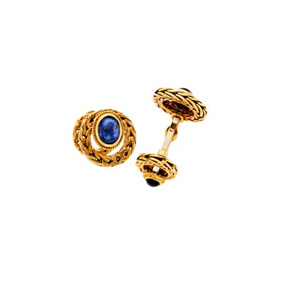 Lot 1133 - Pair of Gold and Cabochon Sapphire Cufflinks