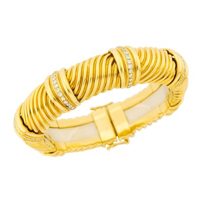 Lot 1129 - Gold and Diamond Bangle Bracelet