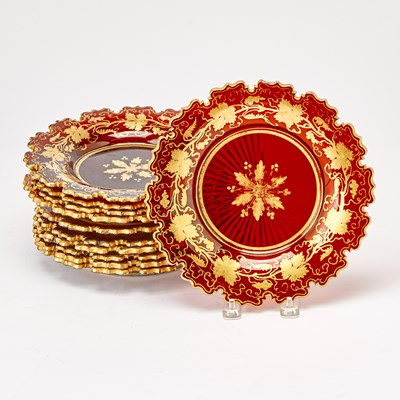Lot 284 - Set of Eleven Bohemian Style Blown, Cut and Gilt Decorated Ruby Glass Dessert Plates