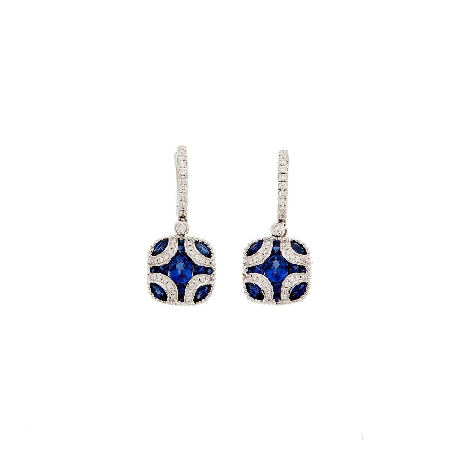 Lot 1061 - Pair of White Gold and Sapphire Pendant-Earrings