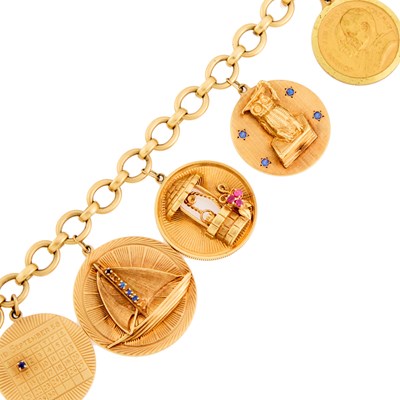 Lot 1058 - Gold, Gilt-Metal and Gem-Set Charm Bracelet
