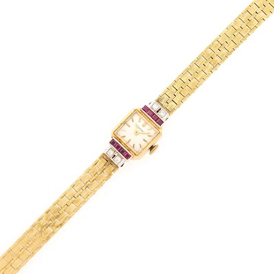 Lot 1172 - Concord Two-Color Gold, Ruby and Diamond Wristwatch