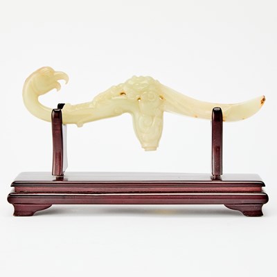 Lot 444 - A Chinese Carved Celadon Jade Handle