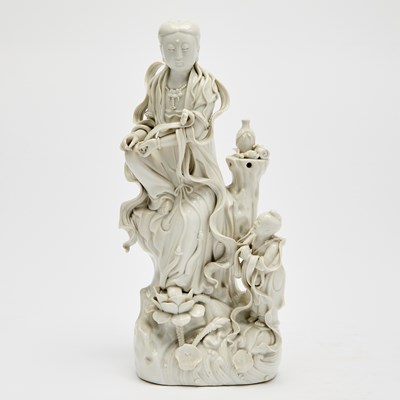 Lot 574 - A Chinese Dehua Porcelain Figure of Guanyin