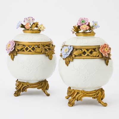 Lot 358 - Pair of Louis XV Gilt-Bronze Mounted and Flower Encrusted White Glazed Porcelain Potpourri Vases